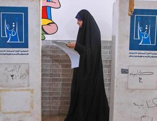 Iraqis vote in general election in rare moment of calm