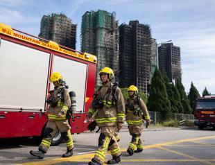 Death toll from Hong Kong fire climbs to 128