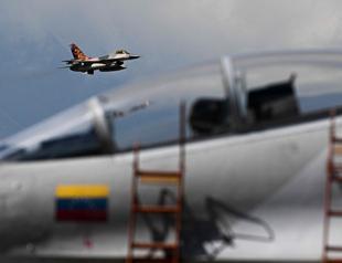 Trump ramps up Venezuela threats, warns airspace closed
