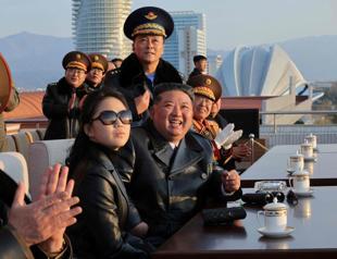 North Koreas Kim vows strategic assets for air force