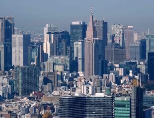 Japan revises economic data to show bigger contraction