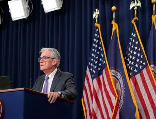 Divided US Fed makes third straight rate cut on jobs risks