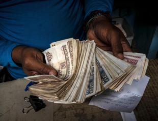 Cubas communist party postpones congress, citing economic crisis