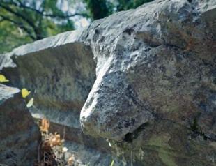 Lion-headed gargoyle destroyed at ancient city