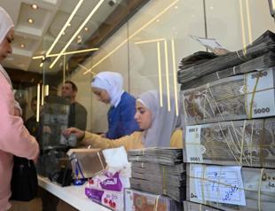Syria to start replacing currency from January 1