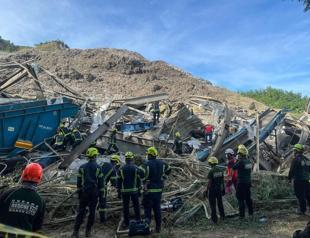 One dead, dozens missing after Philippine dump site collapse