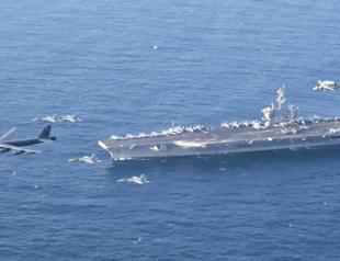 US deploys aircraft carrier as Iran warns against attack