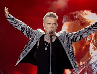 Robbie Williams tops Beatles with record UK number one albums