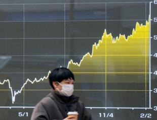 Asian stock markets rise, dollar dips as traders await US jobs