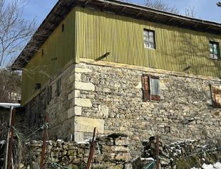 Roman temple stones used in village houses