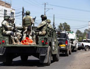 Mexico deploys 10,000 troops to end violence over drug lords death