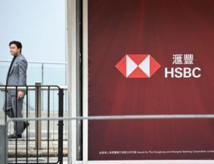 HSBC says its net income fell $1.8 bln to $21.1 bln in 2025
