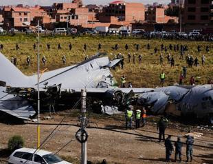 Police raid homes seeking banknotes after Bolivian plane crash