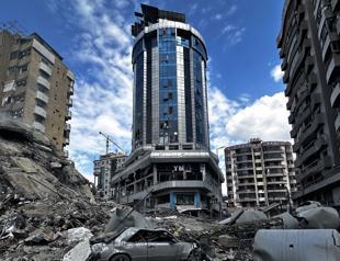 Iran says can fight for months as Israel strikes Beirut hotel