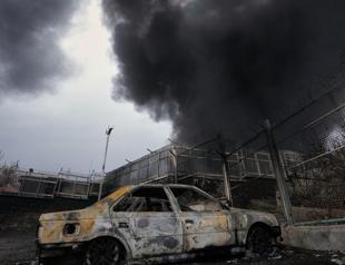 Tehran plunged into darkness by smoke from burning oil