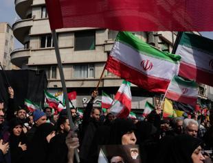 Iran threatens prolonged war as Trump says it is near defeat