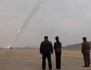 Kim observes rocket launch test with daughter