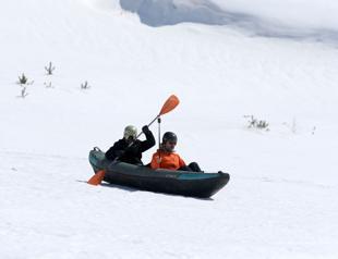 Kayakers glide over snow at Mount Erciyes in unusual winter experiment