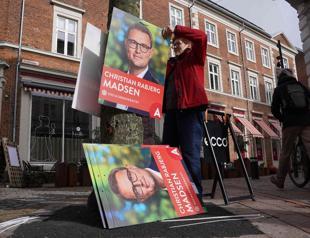 Danish PM bids for third term in general election