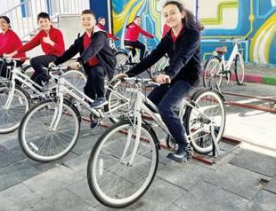 Students generate power by pedaling at Istanbul school