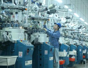 Chinas factory activity expands fastest in a year