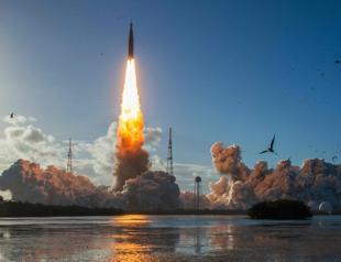 Astronauts begin NASA lunar mission after climactic blast-off