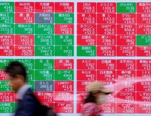 Asian stocks rally, crude drops on lingering hope for a peace deal