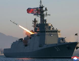 North Koreas Kim oversees navy cruise missile test
