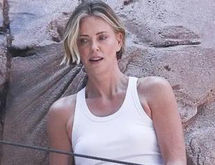 Charlize Theron scales Times Square billboard