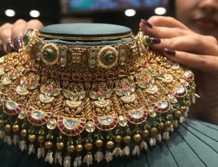 India hikes gold, silver duties to protect sliding rupee