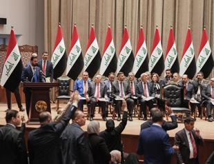 Iraq PM vows monopoly on arms as parliament approves gov’t