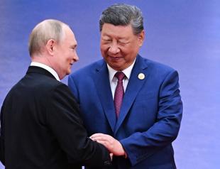 Xi hosts Putin in Beijing days after Trump