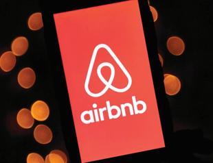 Airbnb expands into hotels, cars, groceries