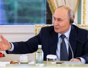 Putin to confront economy at Russian Davos, under threat of Ukrainian drones