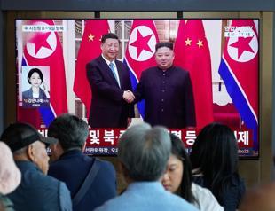 Chinas Xi lands in North Korea for rare visit