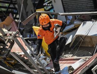 Outdoor hospitals, shaken communities as Philippine quake toll rises