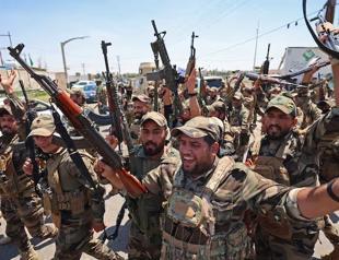 Iraq sets September deadline for integration of armed groups