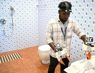The Indian workers training AI robots to take their jobs
