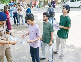 Tight security as India holds exam retest after leak scandal