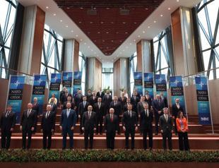 Defense chief hosts NATO counterparts at military HQs