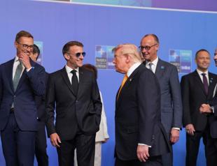 Trump tempers fury to end NATO summit on high note