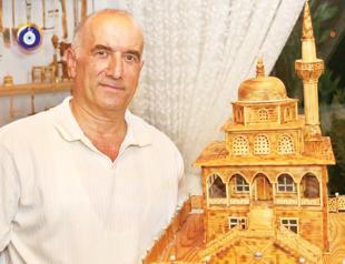 Retiree turns wood into miniature landmarks