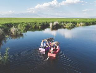 Swelling waterways treat sightseers to scenic boat tours