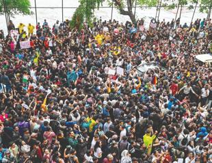Modi vows crackdown on exam fraud fuelling protests in India