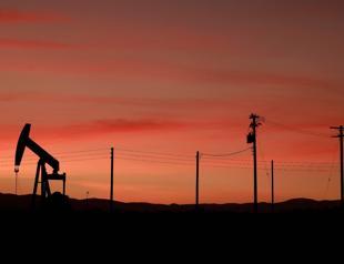 World oil prices jump 5% on Mideast strikes