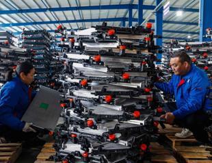 China factory activity slides in July, missing forecasts