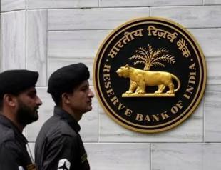The Indian central bank holds rates as it assesses the Mideast shock.