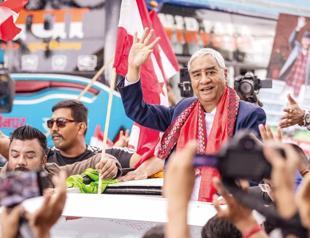 Former Nepalese PM Deuba returns home