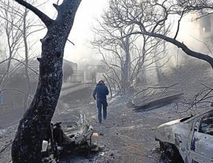 Fires near Athens controlled after claiming two lives