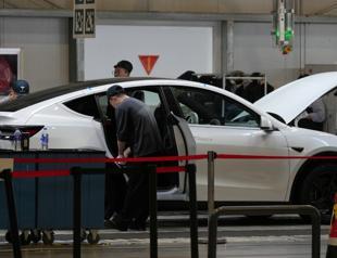 Millions of Teslas recalled in China over door handle safety